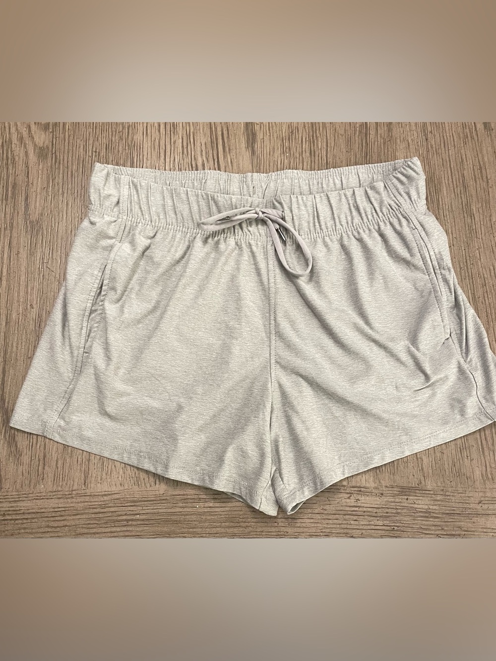 Athletic Works women’s shorts, light gray, medium, super soft, has pockets.